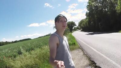 Cute twink films himself in nature before having his dick toyed with