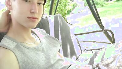 Cute twink films himself in nature before having his dick toyed with