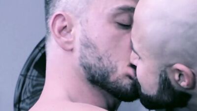 Hairy hunk fucks a bald and bearded stud after blowjobs