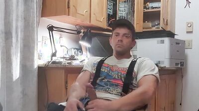 Amateur hunk pulls his cock out of his jeans and jerks off