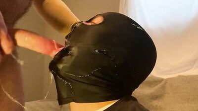 Masked guy chokes deepthroating a throbbing cock and gets covered with cum