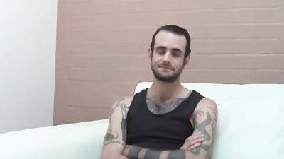 Inked and skinny amateur strips after an interview and jerks off