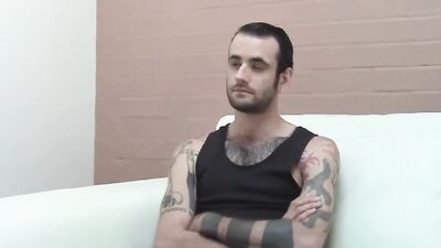 Inked and skinny amateur strips after an interview and jerks off