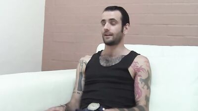 Inked and skinny amateur strips after an interview and jerks off