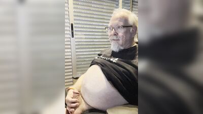 Chubby older guy with white beard and glasses jerks off