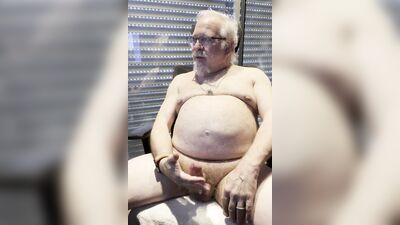 Chubby older guy with white beard and glasses jerks off