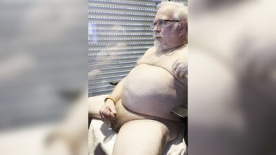 Chubby older guy with white beard and glasses jerks off