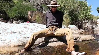 Horny dude goes to a creek in nature to jerk off