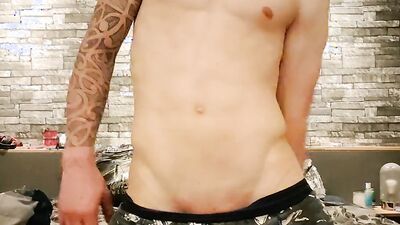 Sexy twink with tattoos jerks off and shows his ass