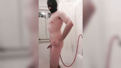 masked amateur teases naked and gives himself an enema in the shower