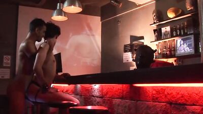 Twinks dick sucking and fucking on a counter in a bar