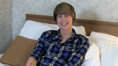 Cute twink dildoes his tight ass while stroking his monster cock