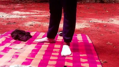 Naughty black dude strips in a park and shows his amazing ass