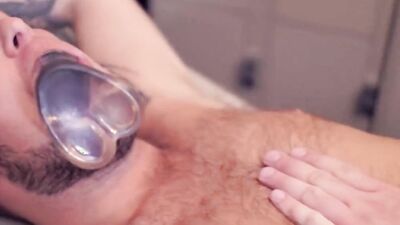 Chubby and bearded hunk teases a guy with a dildo before fucking him