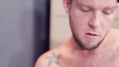 Chubby and bearded hunk teases a guy with a dildo before fucking him