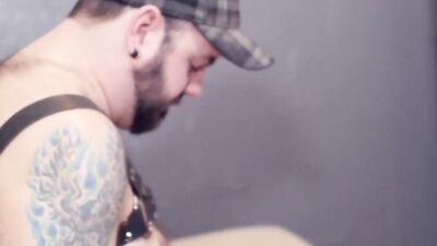 Chubby and bearded hunk teases a guy with a dildo before fucking him