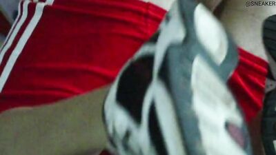 Naughty biker with a helmet on tugs on his cock