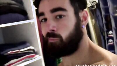 Handsome and bearded stud oils his fit body up and fucks a fleshlight