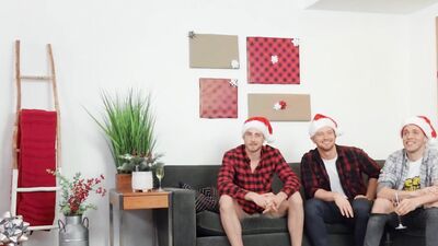 Three dashing guys in Christmas hats and pajamas fuck hard