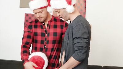 Three dashing studs in Christmas outfits dick sucking and anal banging