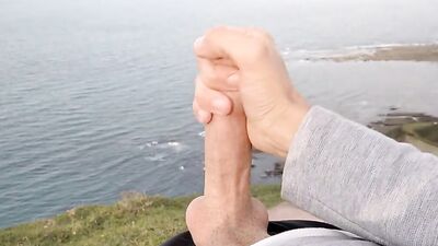 Amateur with an amazing dick films himself jerking off outdoors