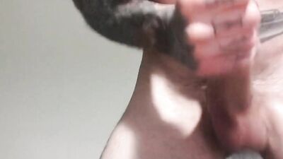 Inked stud strips down to socks and sneakers to jerk off