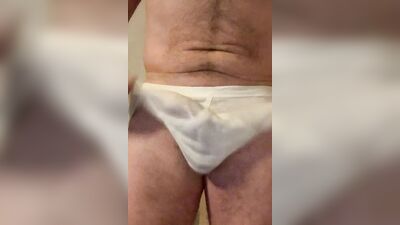 Mature guy pulls his dick out to play with it