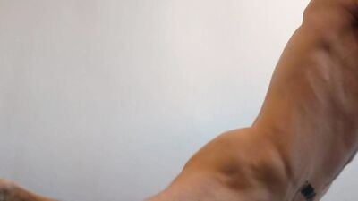 Bald and muscular stud jerks off and fucks a sex toy