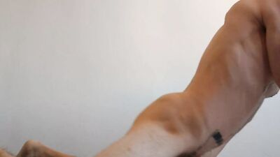 Bald and muscular stud jerks off and fucks a sex toy