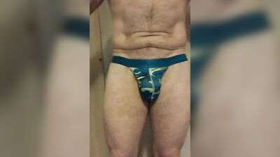 Mature amateur teases with his monster cock in various undies