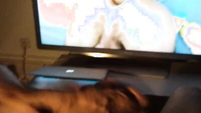Naughty amateur watches porn while playing with his cock and balls