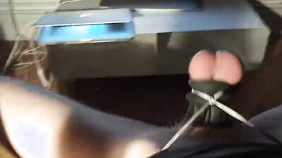 Naughty amateur watches porn while playing with his cock and balls