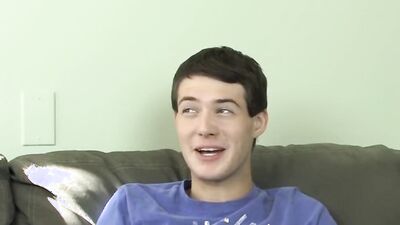 Cute twink has fun at an interview before stripping and jerking off