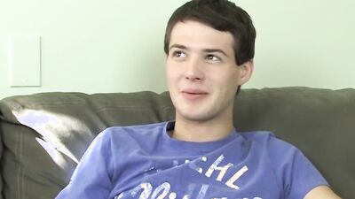 Cute twink has fun at an interview before stripping and jerking off