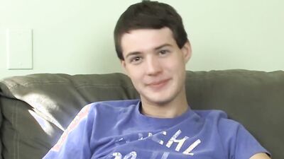 Cute twink has fun at an interview before stripping and jerking off