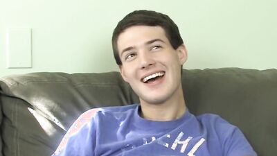 Cute twink has fun at an interview before stripping and jerking off