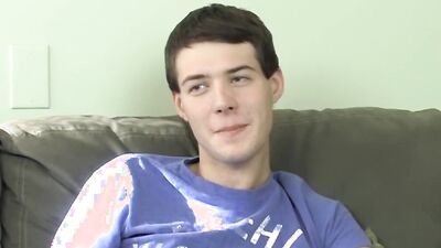 Cute twink has fun at an interview before stripping and jerking off