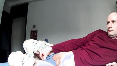 Kudoslong striping and wanking his shaved uncut cock