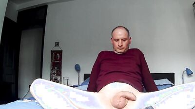 Kudoslong striping and wanking his shaved uncut cock