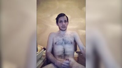 Cute amateur bloke is jerking his prick while filming himself