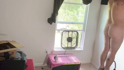 Fat guy films himself naked putting sound insulation in a room