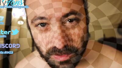 Bearded lad is having fun in front of the camera
