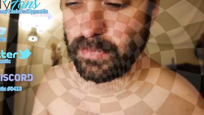 Bearded lad is having fun in front of the camera