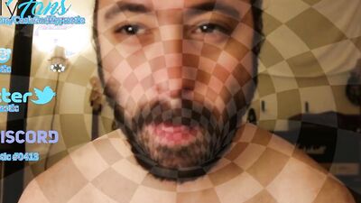 Bearded lad is having fun in front of the camera