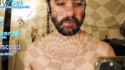 Bearded lad is having fun in front of the camera