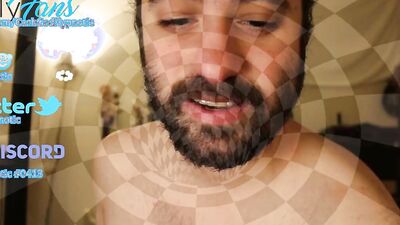 Bearded lad is having fun in front of the camera