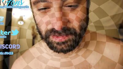 Bearded lad is having fun in front of the camera
