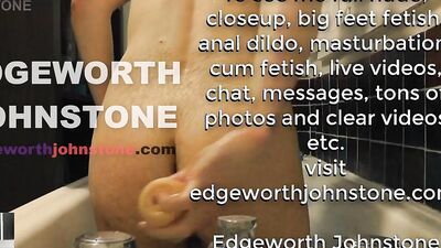 Perverted guy anal rides a huge dildo in a bathtub