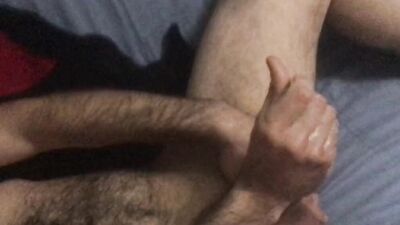Amateur bear is stroking his dick in front of the camera