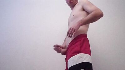 Kudoslong in red shorts playing with his cock and wanking